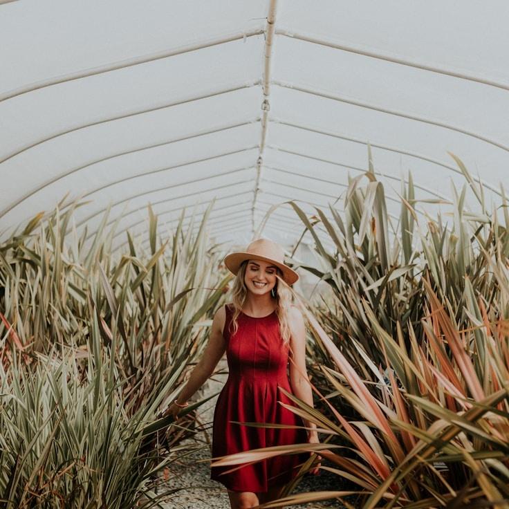 Avery Chen, Lead Design Curator at SketchModulePixel, reviewing corporate floral arrangements